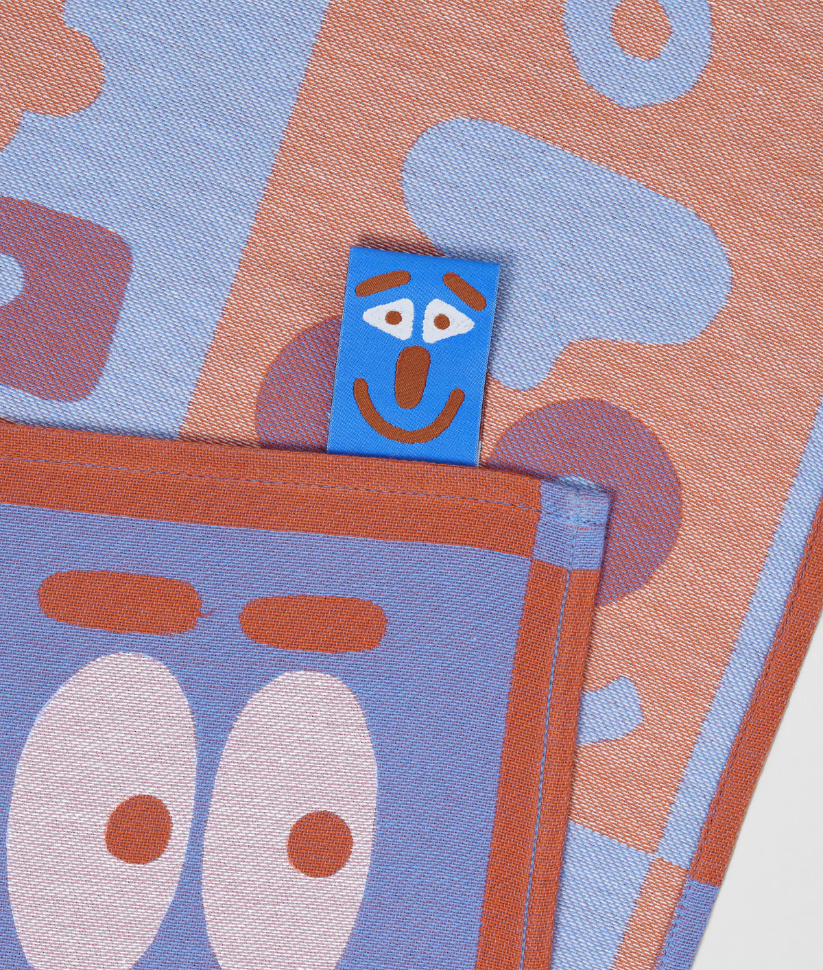 Making Faces Blue/Brown Tea Towel - Image 6